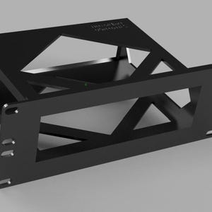 May include: A black metal bracket with a geometric design. The bracket has a rectangular frame with triangular cutouts and mounting holes. The text "TREASURE PHANTOM" is visible on the top.