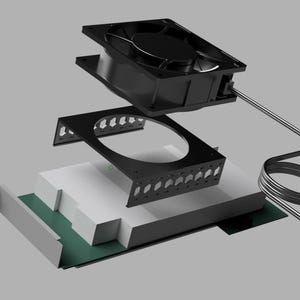 May include: An exploded view of a black computer fan assembly. The components include a fan, a bracket with an oval opening, a white block, and a green circuit board. A cable with a connector is also visible.