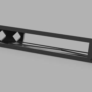 Peut inclure: Un rack en métal noir avec deux découpes en forme de diamant. Le rack est conçu pour contenir des câbles ou des fils.