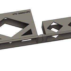 May include: A gray metal bracket with geometric cutouts and the text "NetworkBuck" and "NTG-GSM4210PD". The bracket has a rectangular shape with angled sections and appears to be a component for electronic equipment.