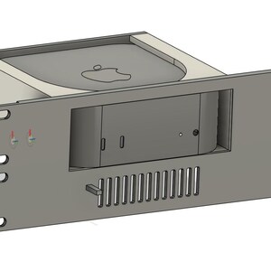 May include: A gray rack mount enclosure designed to house a computer. The front panel has a rectangular opening, ventilation slots, and two small red and blue lights. The Apple logo is visible on the top.
