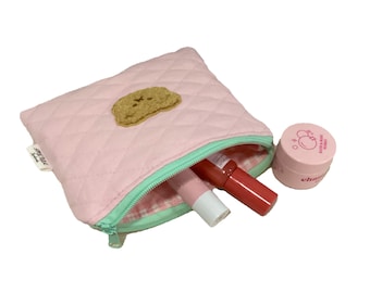 Gewatteerd zakje met teddybeerapplicatie, gevoerd met roze gingang