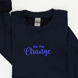 Embroidered &#39;Be the Change&#39; Crewneck Sweatshirt: Trendy Spiritual Sweater
