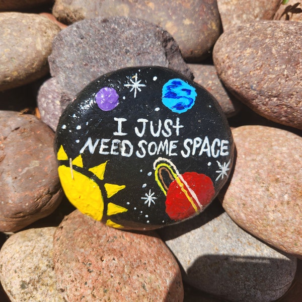 Space themed painted rock