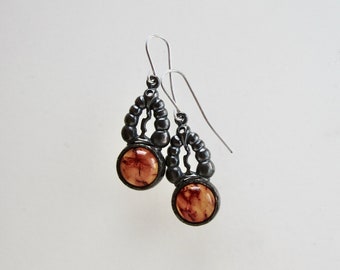 Amber and sterling silver dangling earrings