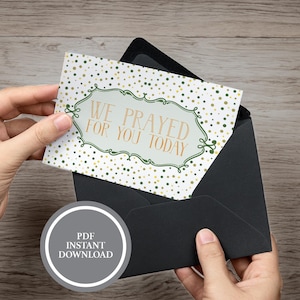May include: A greeting card with the text "WE PRAYED FOR YOU TODAY" in a decorative frame, emerging from a black envelope. The card has a white background with gold and green polka dots. A circular graphic reads "PDF INSTANT DOWNLOAD."