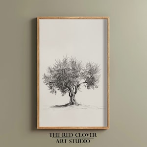 May include: A black and white pencil drawing of a tree with a thick trunk and branches. The tree is framed in a light wood frame. The text "THE RED CLOVER ART STUDIO" is printed below the frame.