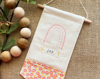 Rainbow Banner - JOY - hand embroidered - pink ombre rainbow - wall hanging on a wood dowel