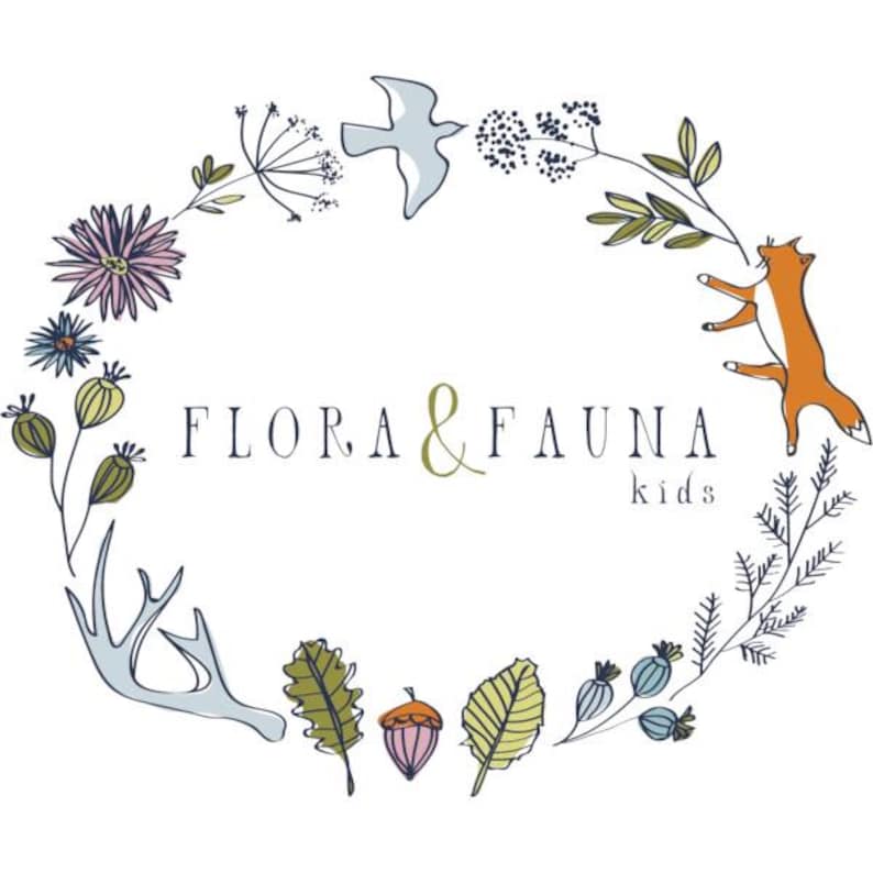 May include: A circular wreath illustration featuring the text FLORA & FAUNA kids in the centre. The wreath is composed of a purple flower, green leaves, an acorn, a light blue bird, a light blue antler, and an orange fox on the right side.