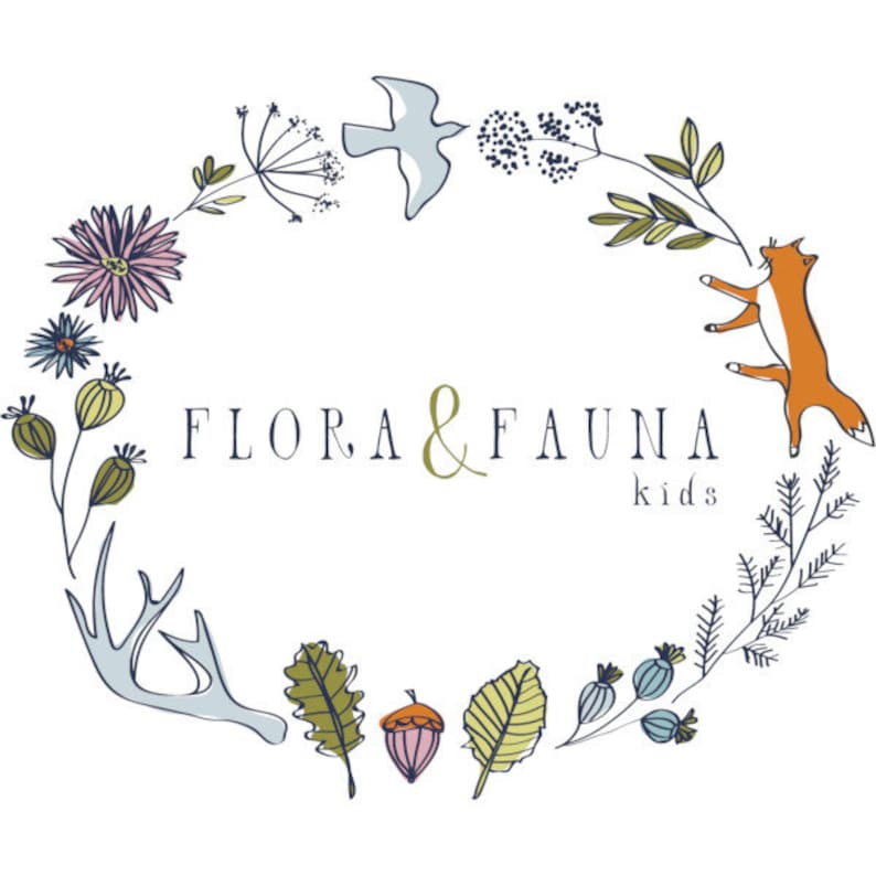 May include: A circular wreath illustration featuring various botanical elements, a light blue bird, an orange fox, and light blue antlers. The text FLORA & FAUNA kids is centred in dark grey and gold, surrounded by flowers, leaves, and seeds.