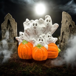 Ceramic Pumpkin with Playful Ghosts: Halloween Decor
