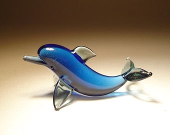 plastic dolphin figurines