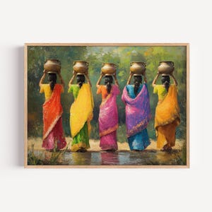 May include: A framed art print depicts five women in colorful saris, each carrying a pot on their head. The women are seen from the back, walking in a line. The saris are in shades of red, yellow, pink, purple, and orange. The background is a lush green forest.