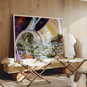 May include: A framed artwork depicting a futuristic city within a transparent structure, set against a backdrop of space. The artwork is displayed above a wooden bench with two folding canvas stools. A white sculpture and a paper lantern are also visible.