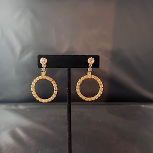 Circle Dangle Clip On Earrings Clear Glass Rhinestones Round Shaped Gold Tone Metal Material Vintage 1970s Costume Jewelry Elsysvintage