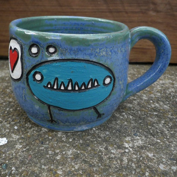 Hand thrown, stoneware, Sgraffito Monster monster mug