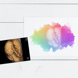 K&ouml;nnte beinhalten: Ein 3D-Ultraschallbild eines Babys im Mutterleib mit einem bunten Aquarellhintergrund.