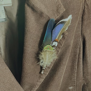 Feather pin hat