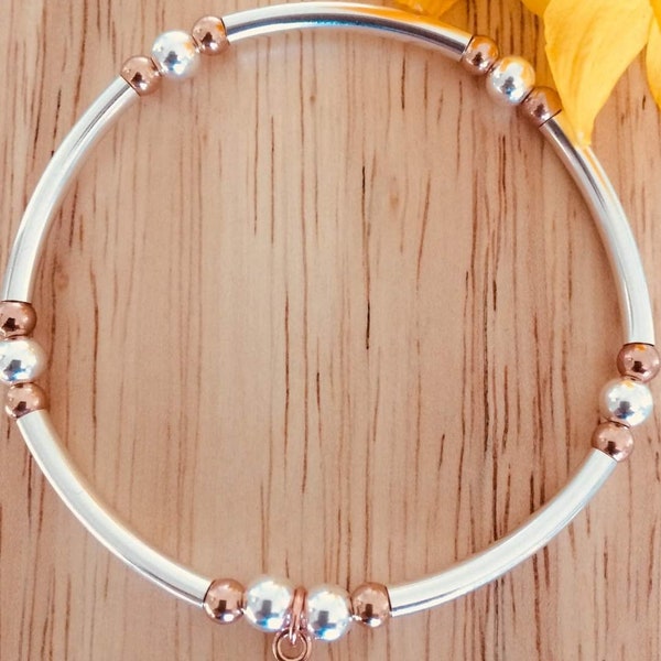 Sterling Silver Stacking Bracelet with noodle beads and 5mm round beads. Fabulous Apple Charm