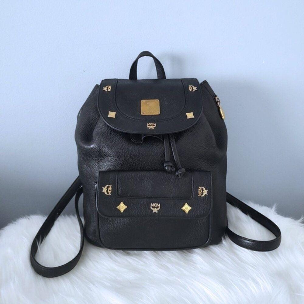 MCM Black Quilted Backpack with Gold Accents EUC MCM Black Visetos Stark Insignia Black gold and silver  main image 4