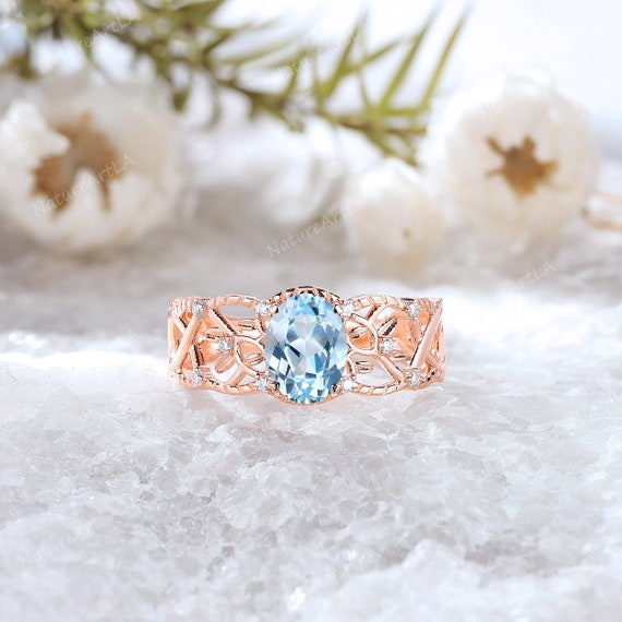 Oval Cut Diamond Ring With Aquamarine Accents Oval Cut