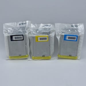 May include: Three printer ink cartridges in individual plastic packaging. The cartridges are labeled "Brother" and are color coded black, yellow, and cyan.