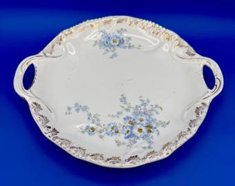 Plato para tarta de porcelana KPK Alemania: Nomeolvides floral, detalles dorados