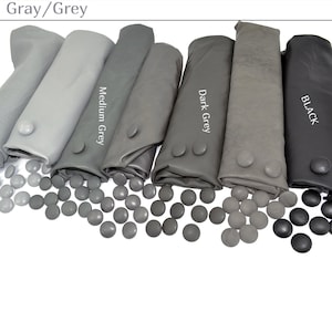 May include: A set of three ceramic mugs with a speckled, matte finish. The mugs are in shades of cream, light gray, and dark gray. Each mug has a simple, minimalist design, perfect for coffee or tea.