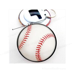 May include: A white baseball with red stitching, 2.25 inches in diameter, attached to a bottle opener keychain. The bottle opener is silver with a red and white design.