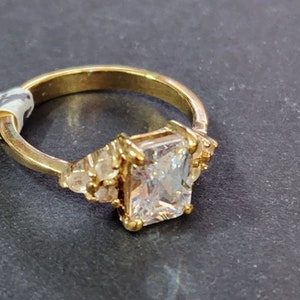 Dainty Vintage Gold Engagement Ring with Clear Faceted Faux Diamond CZs Emerald Cut