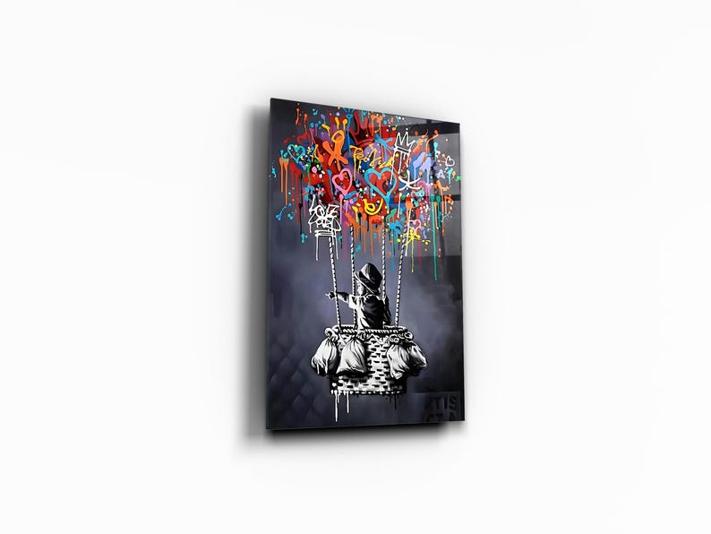 May include: A black and white illustration of a child holding onto a hot air balloon. The balloon is filled with colourful graffiti and drips of paint. The background is a dark grey.
