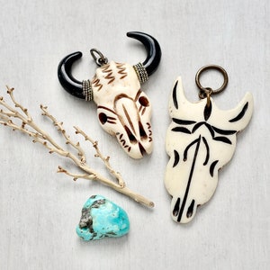 2 Cow Skull Pendants - natural carved bone and horn buffalo longhorn bull skulls - tribal Southwestern jewelry supplies