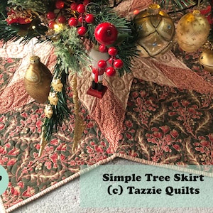 May include: A quilted Christmas tree skirt in shades of green, red, and cream with a starburst design. The skirt is 46 inches in diameter and has a simple tree skirt (c) Tazzie Quilts label.