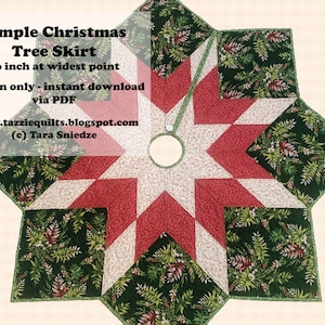 May include: A red and white star pattern Christmas tree skirt with a green fern print border. The skirt is 46 inches wide. The text "Simple Christmas Tree Skirt" is at the top of the image. The text "46 inch at widest point" is below the title. The text "Pattern only - instant download via PDF" is below the measurement. The text "www.tazziequilts.blogspot.com" is below the download information. The text "(c) Tara Sniedze" is below the website address.