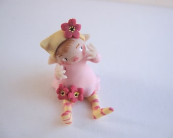 Tiny flower fairy figurine