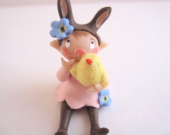 Miniature figurine of easter rabbit doll ornament with  chick