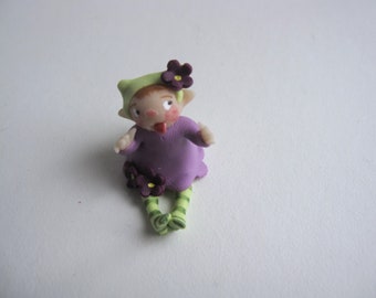 Tiny purple flower fairy figurine