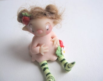 The strawberry fairy miniature figurine doll