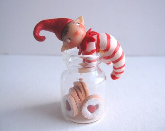 Miniature pixie doll ornament figurine with tiny cookie jar