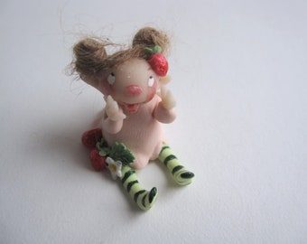 The strawberry fairy miniature figurine doll