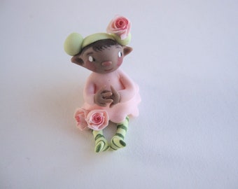 Tiny flower fairy figurine