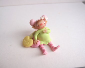 The candy heart fairy figurine miniature elf