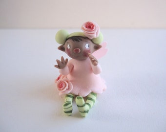 Tiny flower fairy figurine