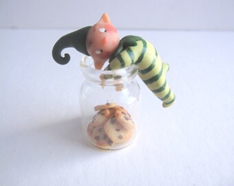 Miniature pixie doll ornament figurine with tiny cookie jar