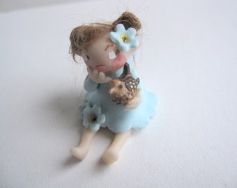 Spring bird fairy figurine