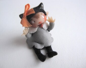 Figura decorativa de elfo gato en miniatura