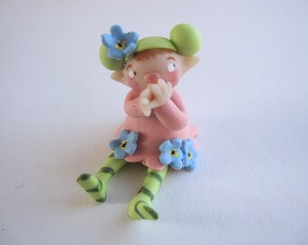 Tiny flower fairy figurine