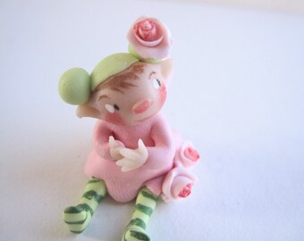 Tiny flower fairy figurine