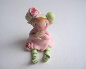 Tiny flower fairy figurine