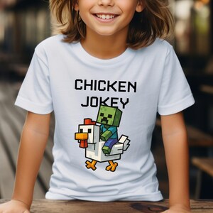 Chicken Jockey T-Shirt, Funny Farm Animal T-Shirt, Perfect for Gamers & Animal Lovers, Cartoon Graphic Shirt, Chicken Lovers Tee, Gamer Gift